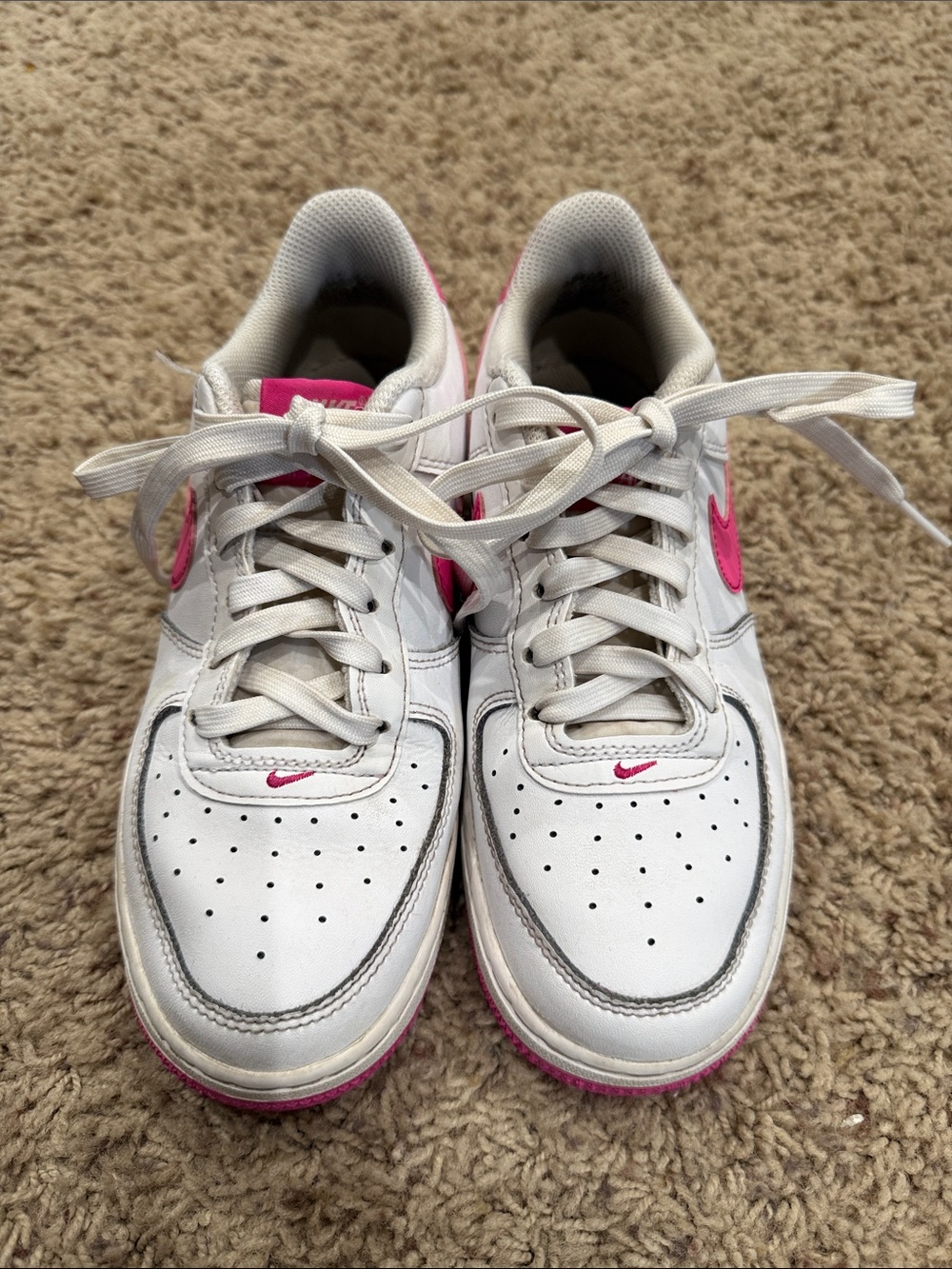 Nike White Sneakers with Pink Swoosh Accents